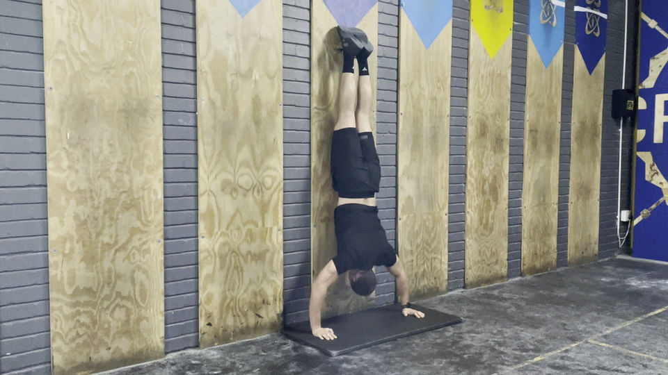 Wall-Facing Handstand Push Up